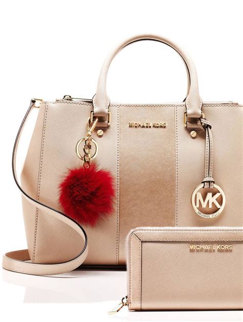 will michael kors purses soften up beanie with use|Michael Kors leather bags.